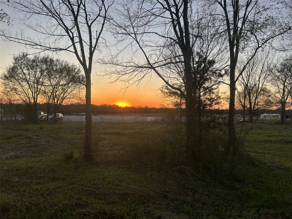 View of sunset from property
