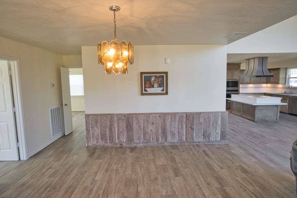 This Photo is of the Hall to the Bedrooms & Dining Area