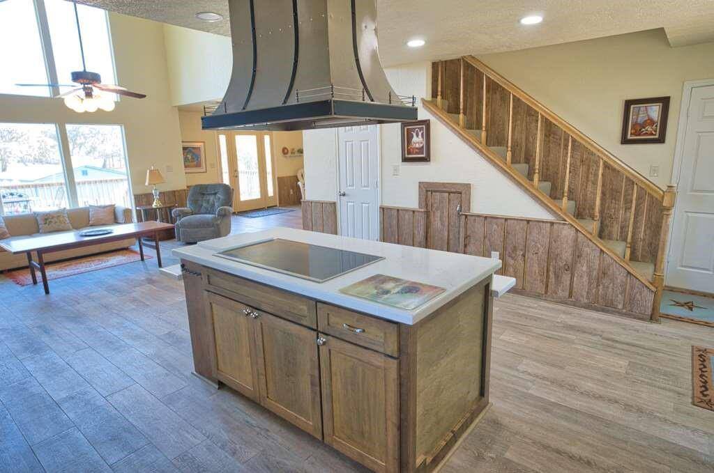 Island Range with Breakfast Bar.  1/2 Bath across from it.