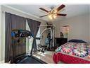 Third bedroom that is being used as a work out room