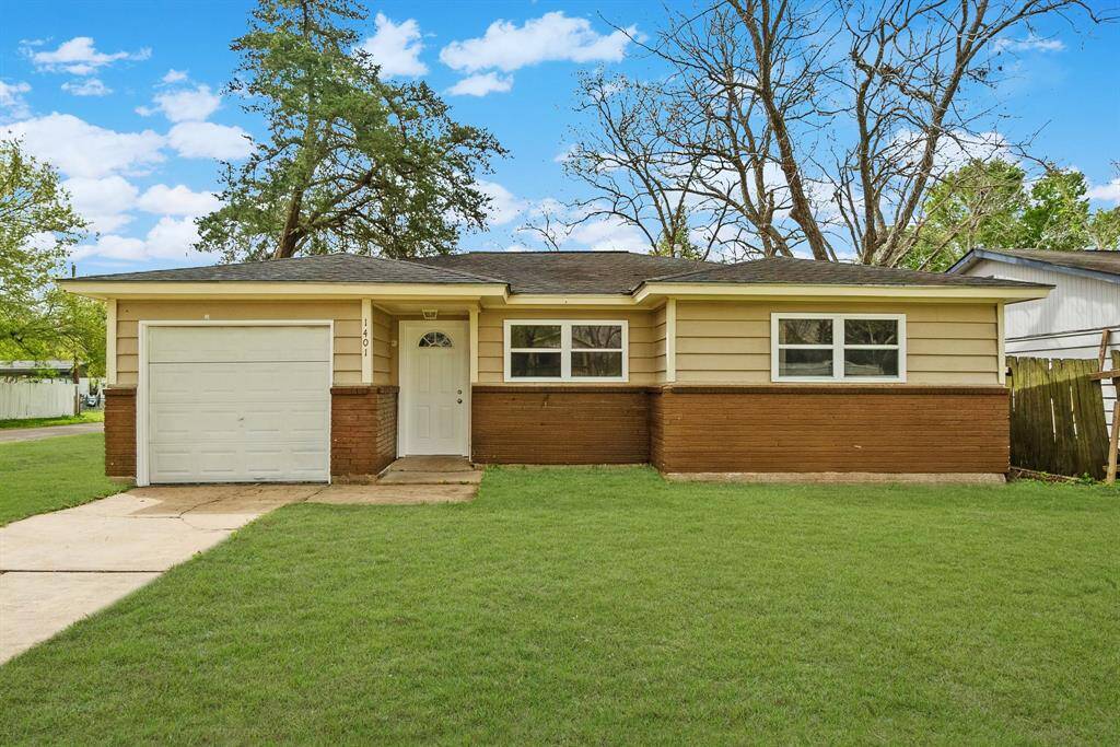 Classic charm with solid curb appeal. We've got brick on the lower half, siding up top, and an attached garage that makes life easy. That front porch? Just enough to give you a warm welcome every time you step inside. Plus, look at all that green space—endless potential!