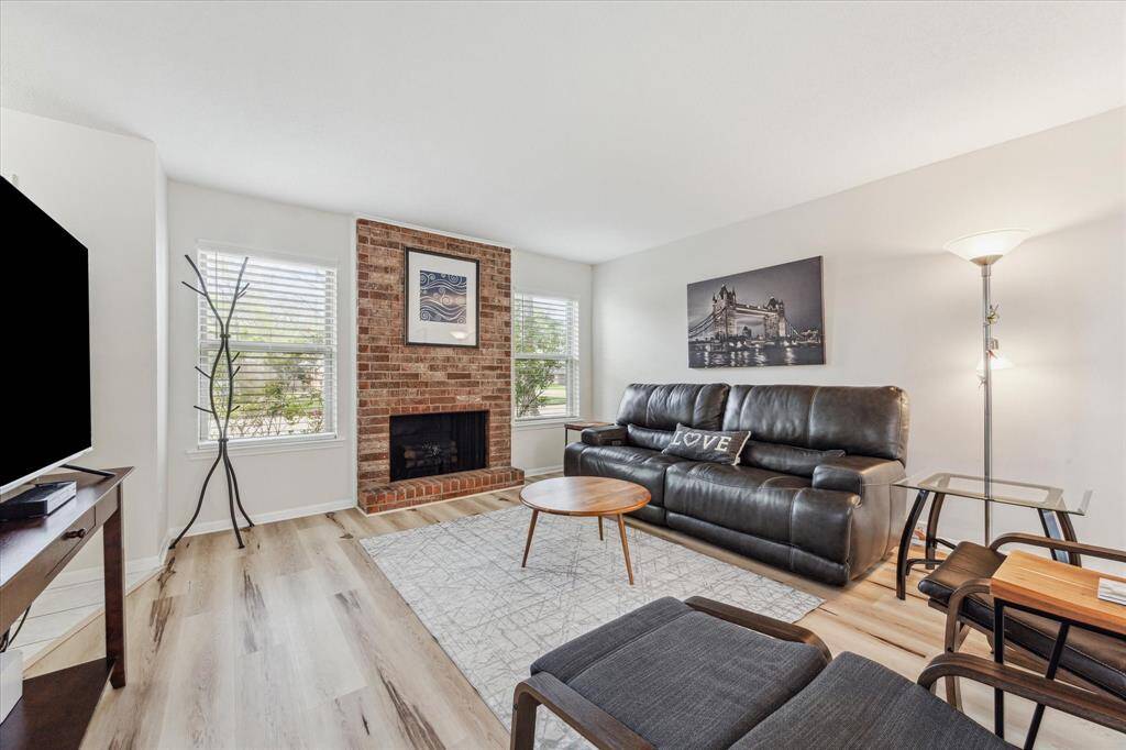 ANOTHER VIEW OF THE LARGE AND BRIGHT LIVING ROOM