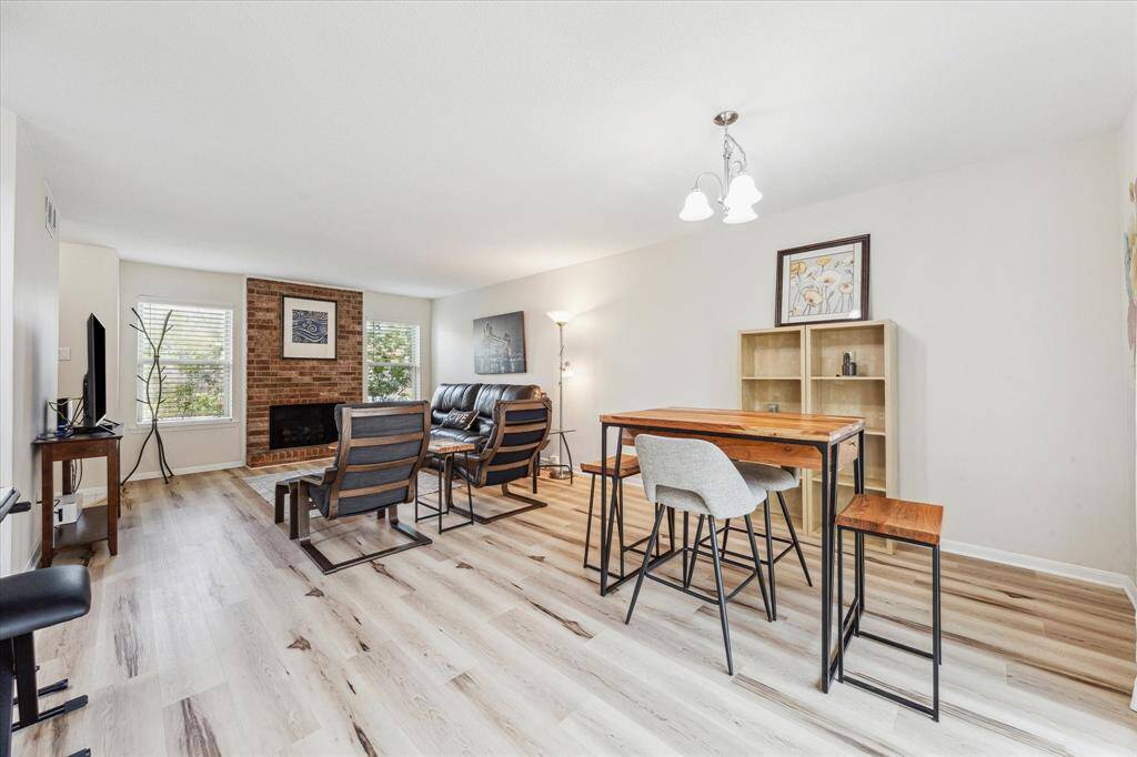 VIEW OF THE OPEN CONCEPT LIVING AND DINING AREAS