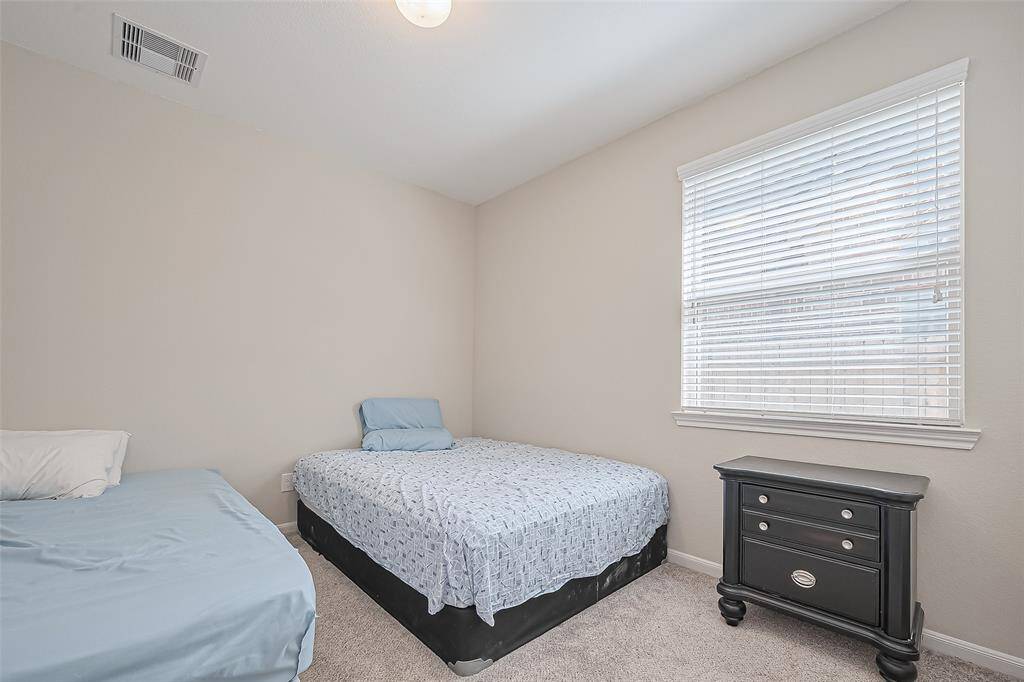One of secondary bedroom on first floor.