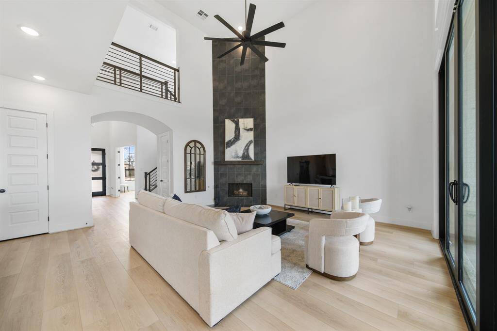 The fireplace is tiled floor to ceiling and is a nice focal point in the family room.