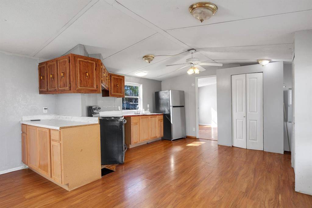 Expansive kitchen with ample room for creativity and entertaining.