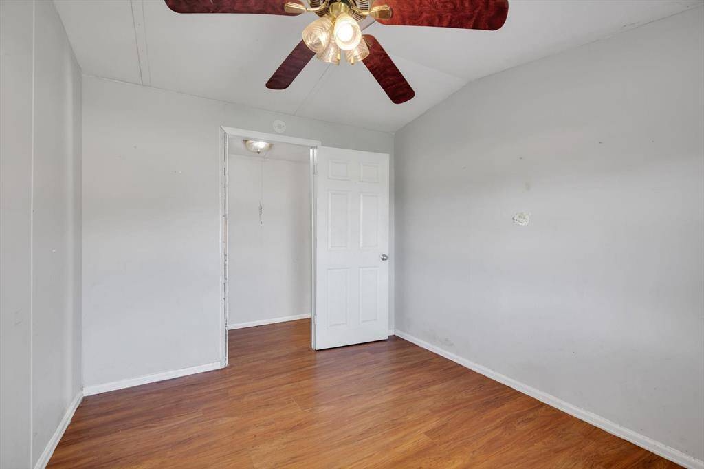 Cozy second bedroom  and ample natural light, perfect for relaxation or a home office.