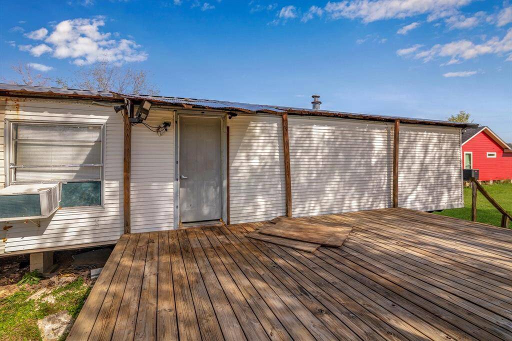 Spacious deck perfect for outdoor relaxation and entertaining, with easy access to the backyard and stunning views.