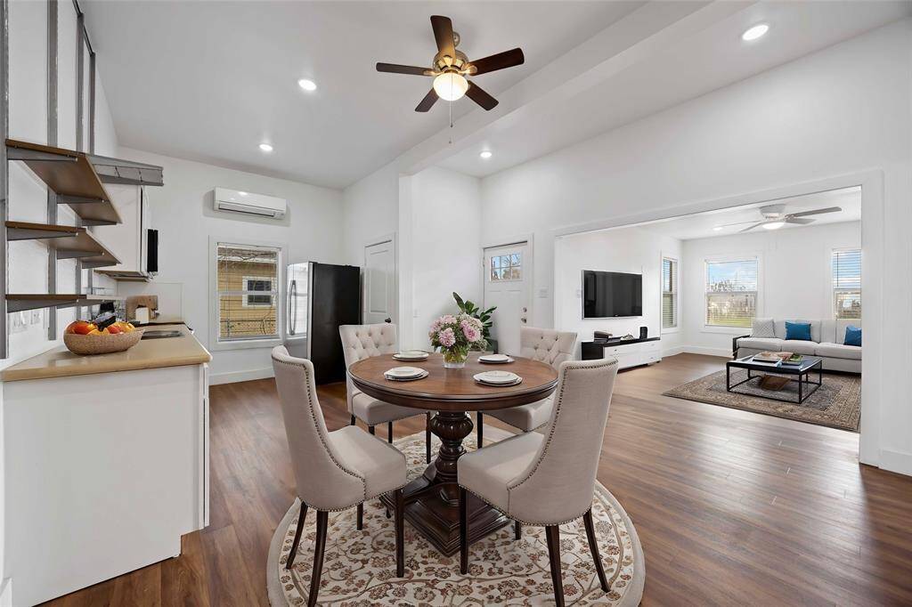 Another view looking from kitchen to living. (virtually staged).