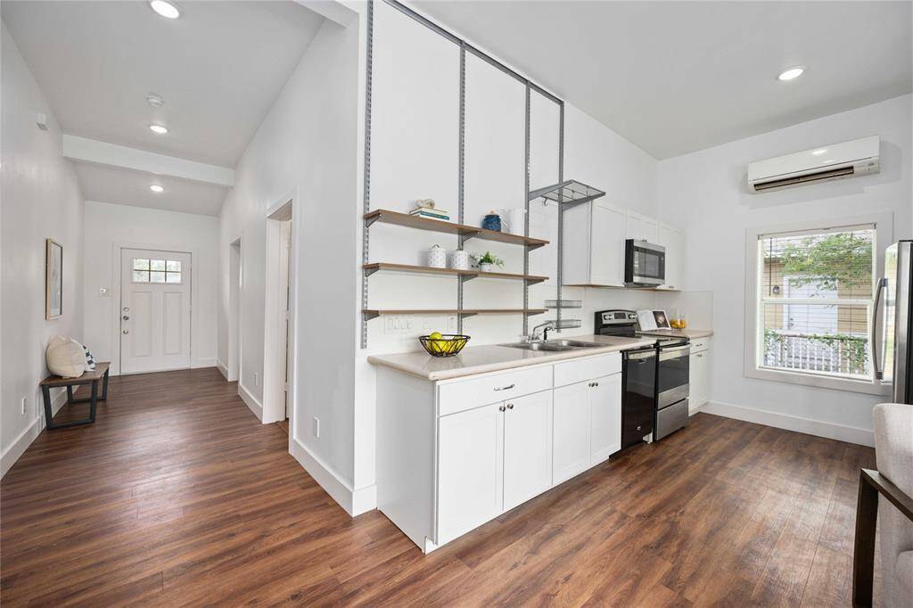 Looking back toward the front door, you'll notice the entry where there is space for a hallway table and decor.