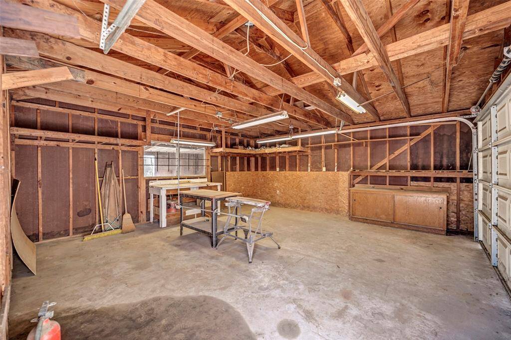 inside of garage also has electricity and a water spigot