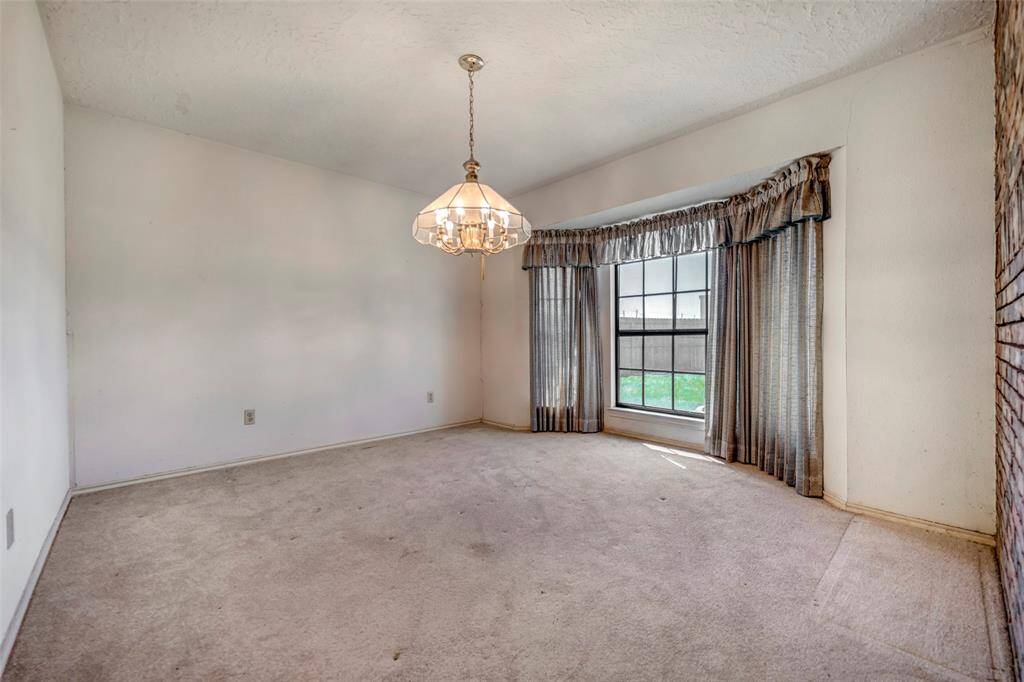 formal dining room situated in the back