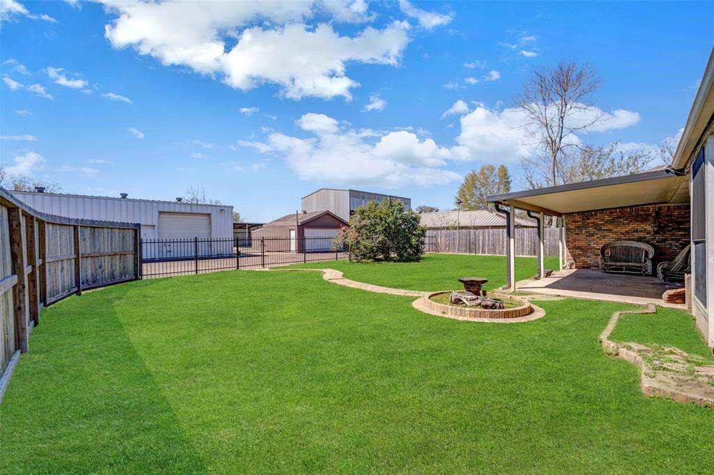back yard with a view to the back area, has walk through gate access