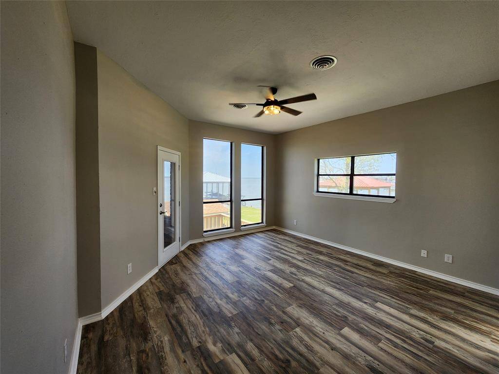 Large master bedroom with high ceilings