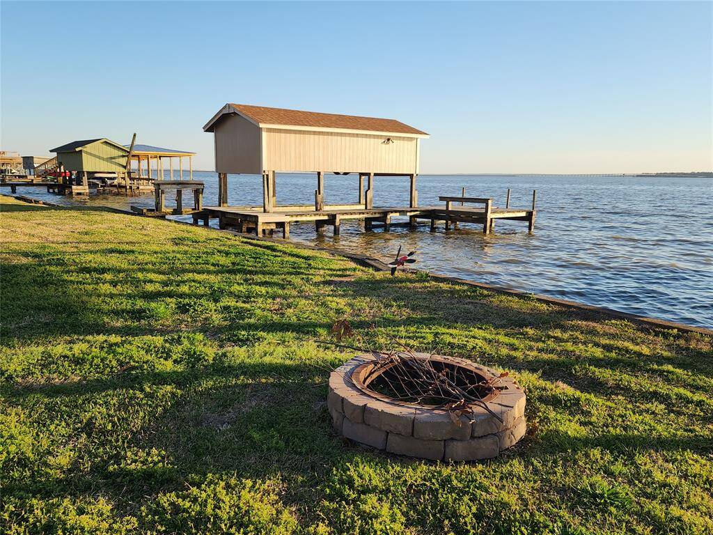 Boat house with fish cleaning station and sunbathing area