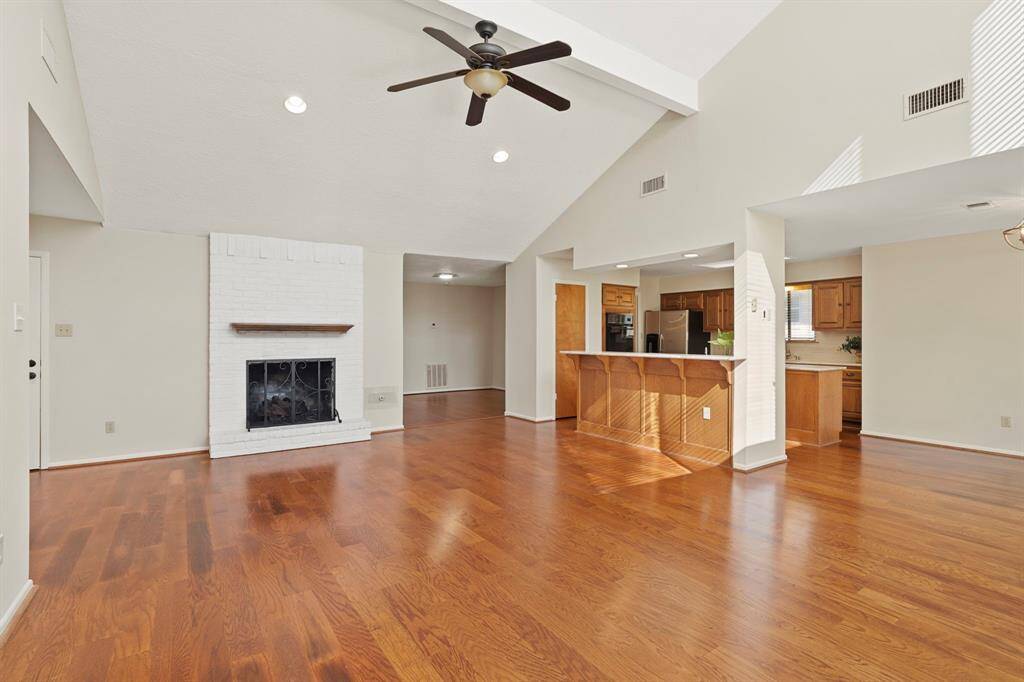 The living room is open to the kitchen and breakfast area.