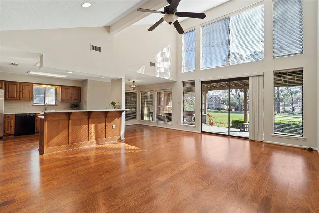 Inside, you'll be greeted by soaring ceilings, an abundance of natural light, and gorgeous wood floors.