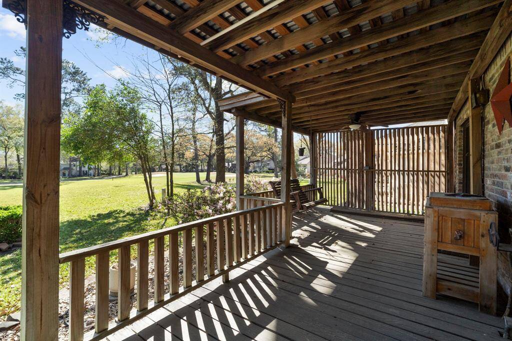 The expansive covered deck spans the entire length of the home providing the perfect setting to relax with your morning coffee or entertain friends and family.