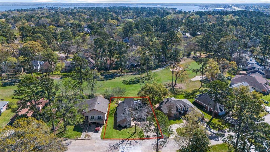 Birds-eye view of the property and surrounding community.