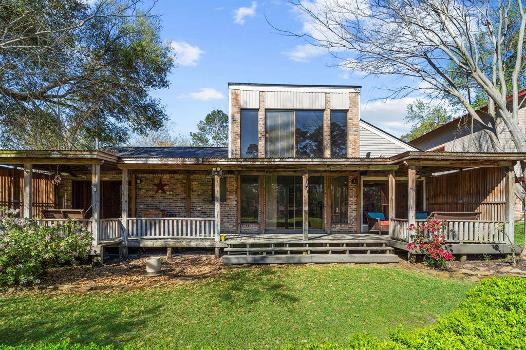 Large windows and glass doors along the back of the home take advantage of the fabulous views.