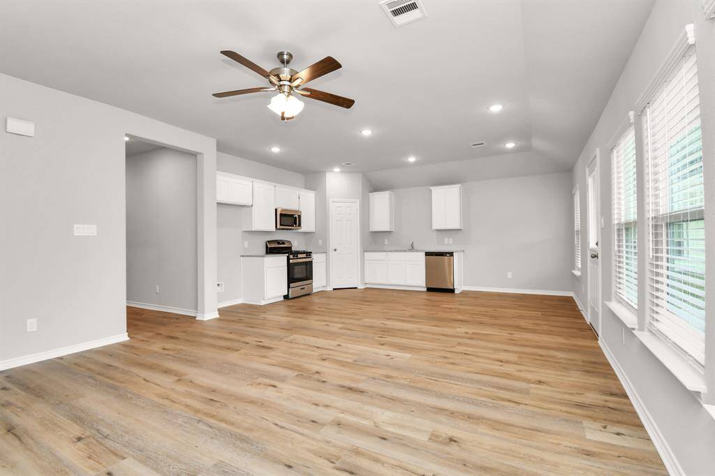 Open-concept living makes this family room feel comfortable and spacious.