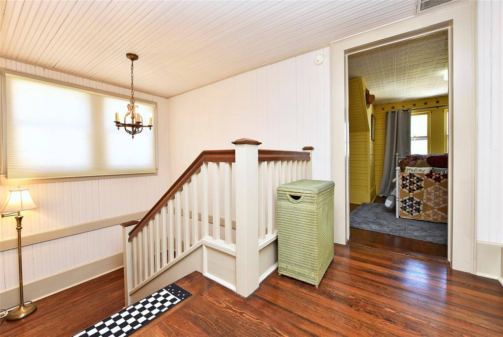 This is the top of stairs in the Main house. There are 2 bedrooms and a large bath and massive storage closet upstairs.