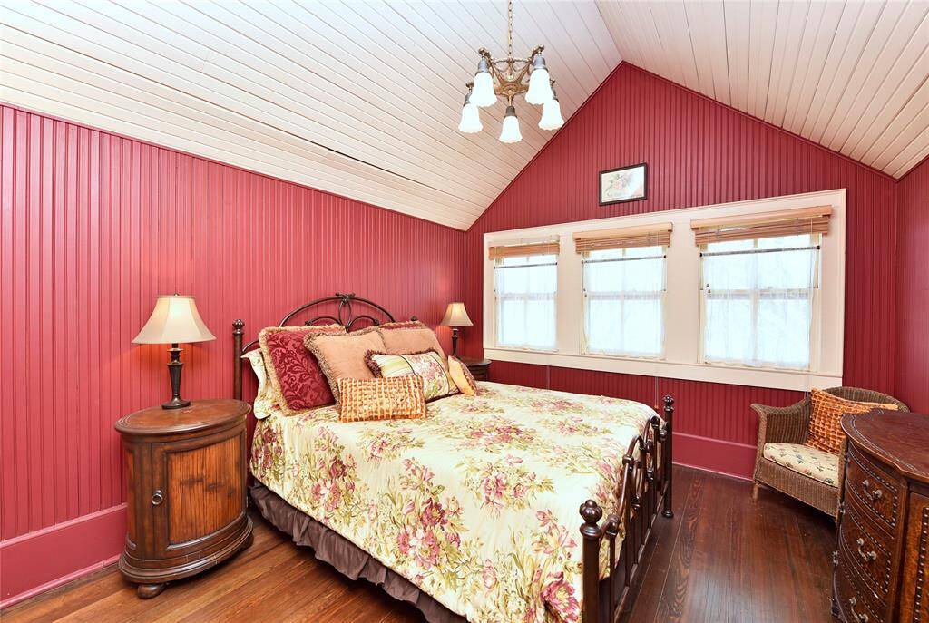 This bedroom is one of the upstairs bedrooms in the Main house. There are unique ceilings in this home in every room.