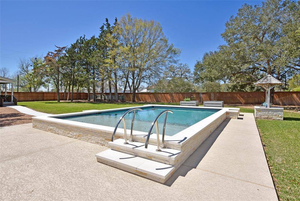 This pool was installed between the two homes less than 2 years ago. There is an electric cover two keep debris out when the leaves are falling.
