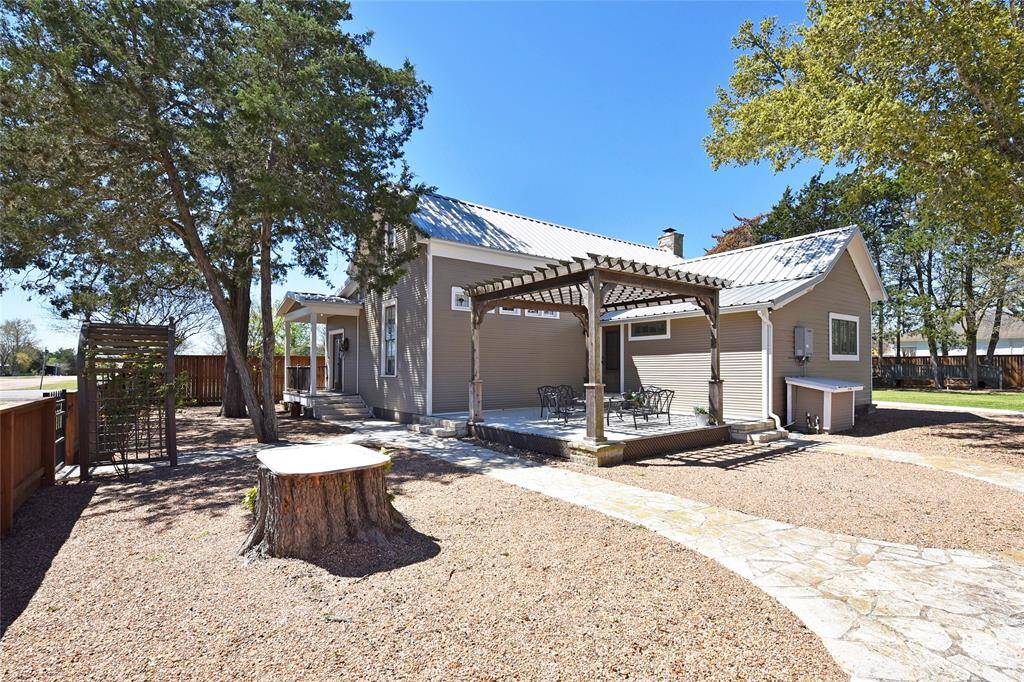 This is a view of the Guest house. The pergola porch makes a great place to relax.