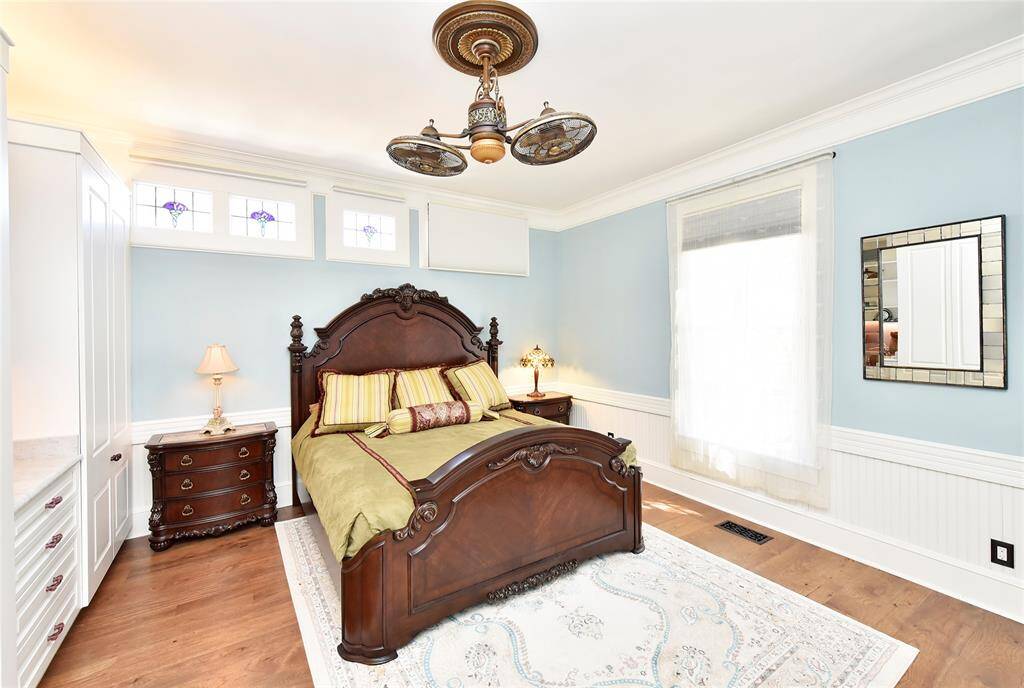 The downstairs bedroom with tons of builtins.