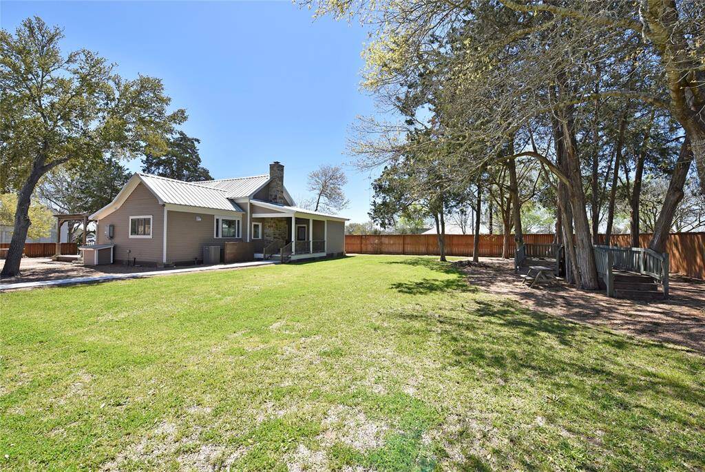 This is a view of the guest house. The the right, under the trees is a play place for the kids.