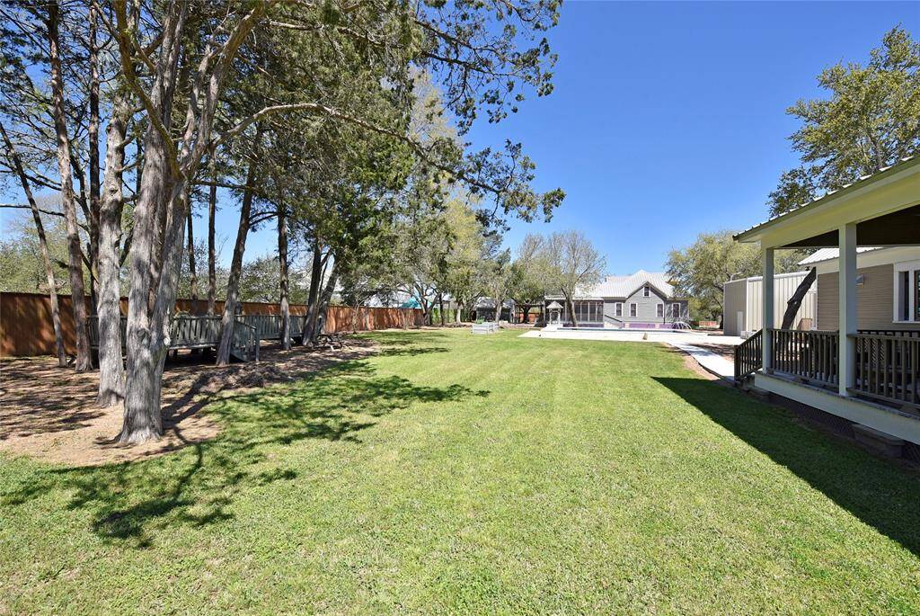 This view is from behind the guest house looking toward the pool and beyond is the Main house.