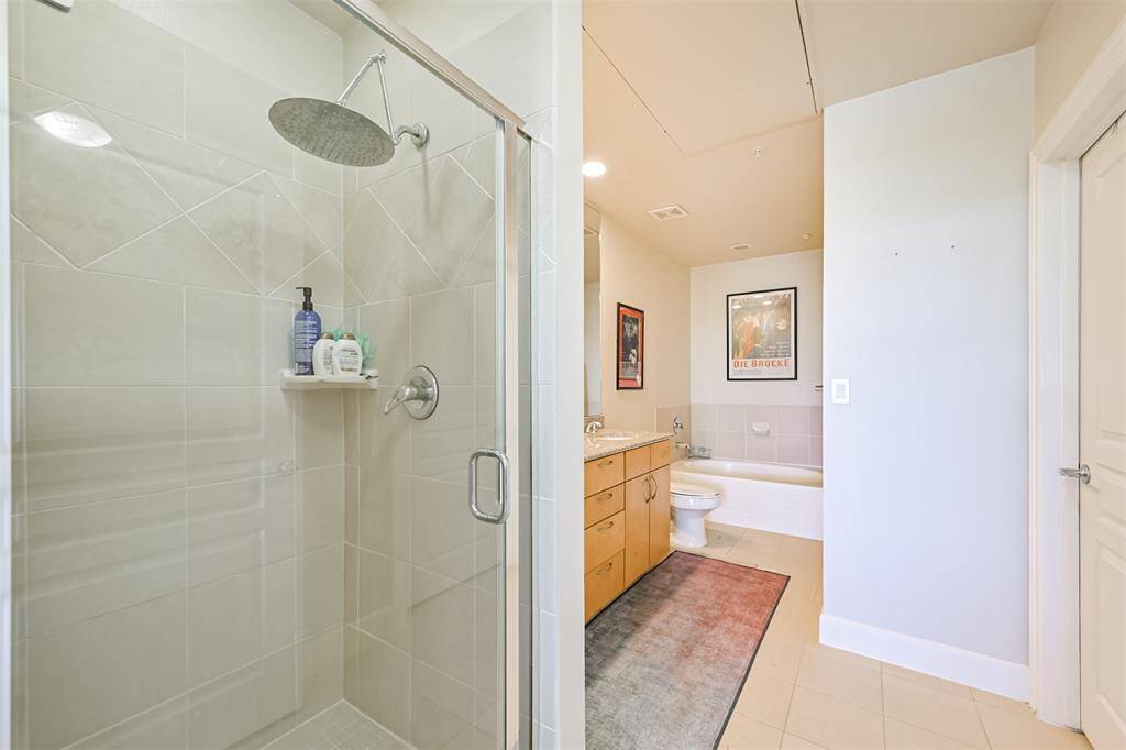 Bathroom has both a tub and separate shower