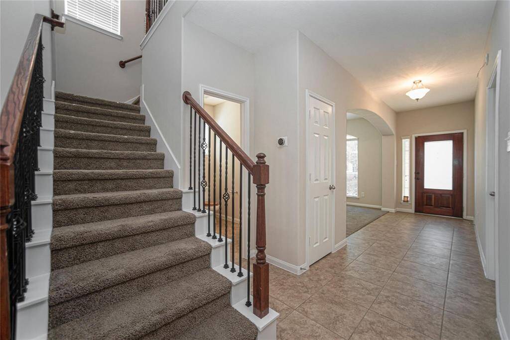 Staircase with beautiful wrought iron balusters