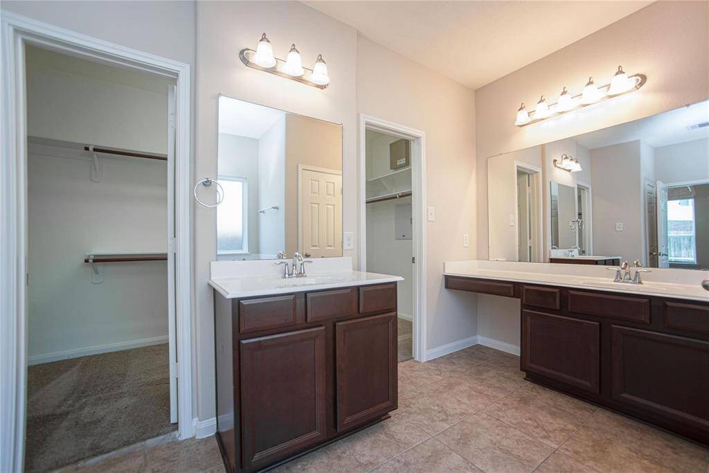 Dual Vanities with Dresser Vanity and 2 separate closets in Primary Bath