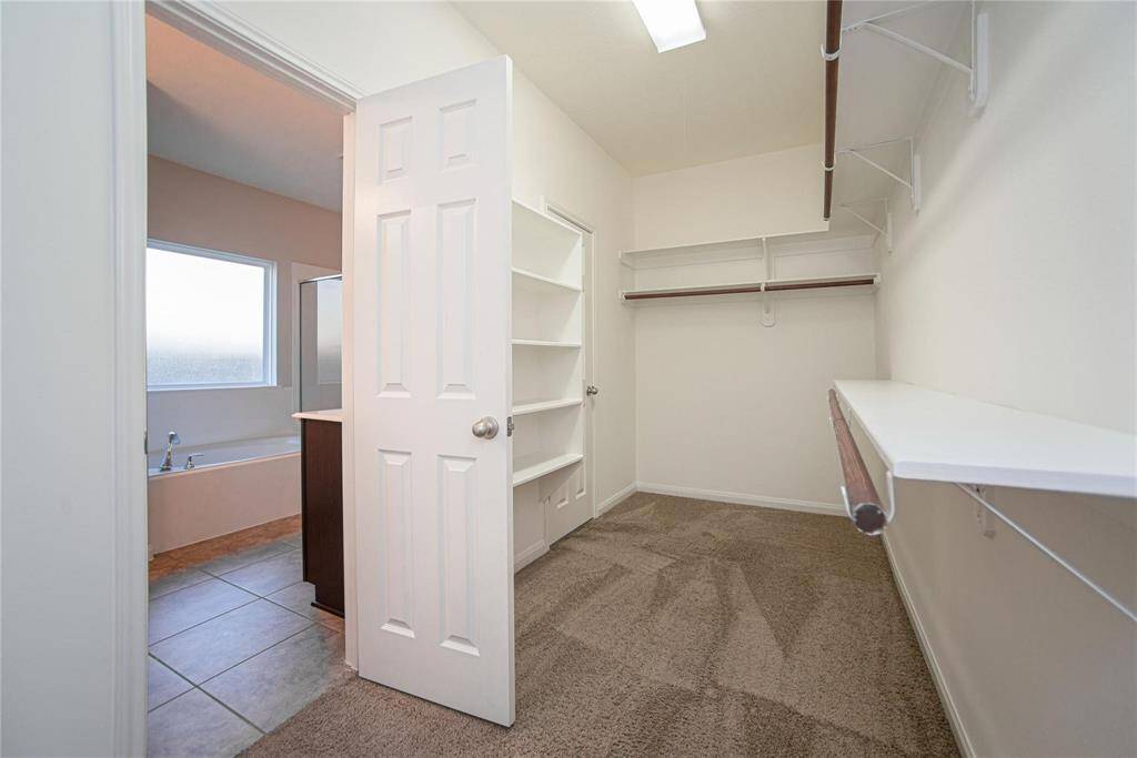 One of 2 closets in Primary Bath