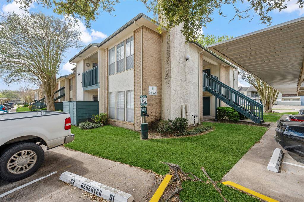 Corner unit - one assigned covered parking space and one additional space not covered.