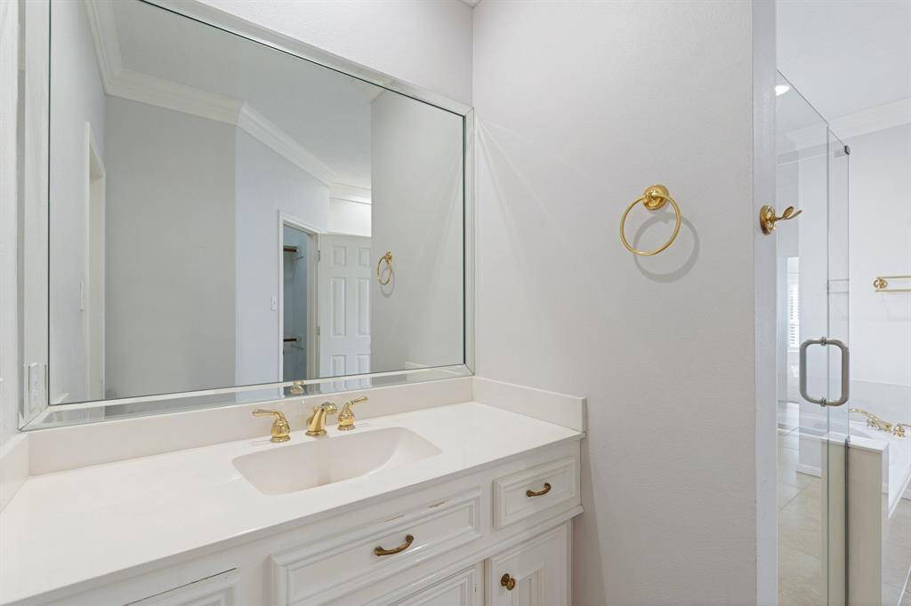 Second vanity on the opposite side of the shower.