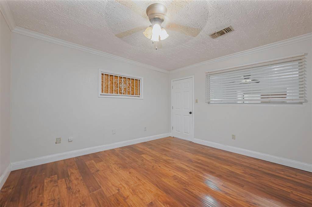 A well-placed window allows natural light to flow between rooms, offering a unique architectural detail while keeping the space bright and connected.