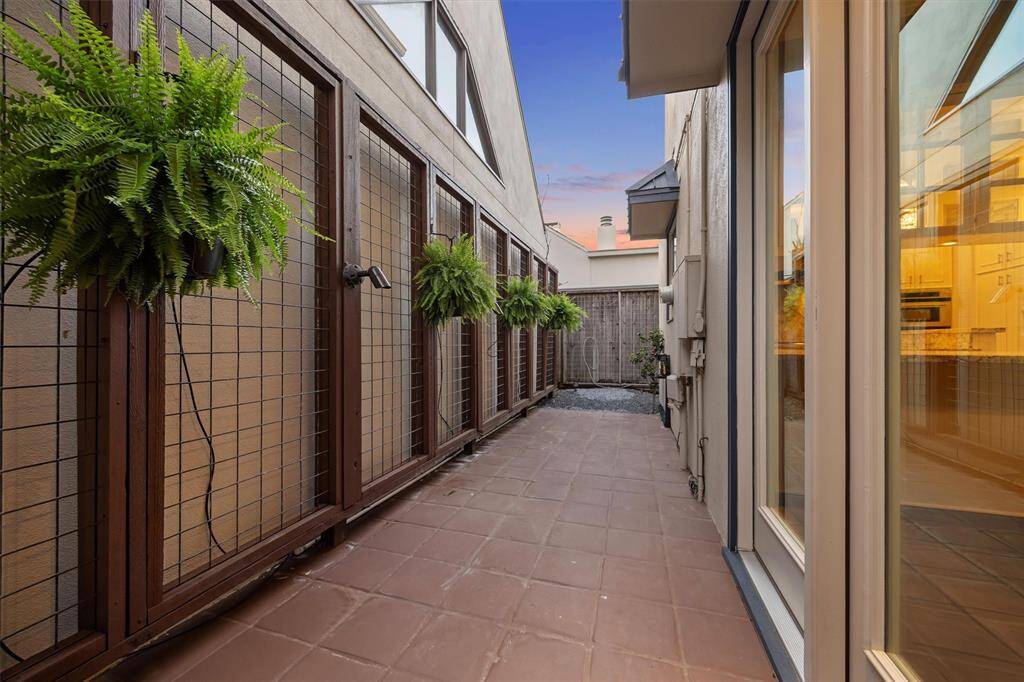 The private back terrace provides an atrium like feel from inside with sky views when out! Saltillo tile patio, in ground irrigation system, automatic landscaped lighting (as is in front), automatic mosquito control system, black star crushed granite and more! Maintenance free at its best! Will you turf some of this for pets or put your favorite landscape finishes here, or both?!