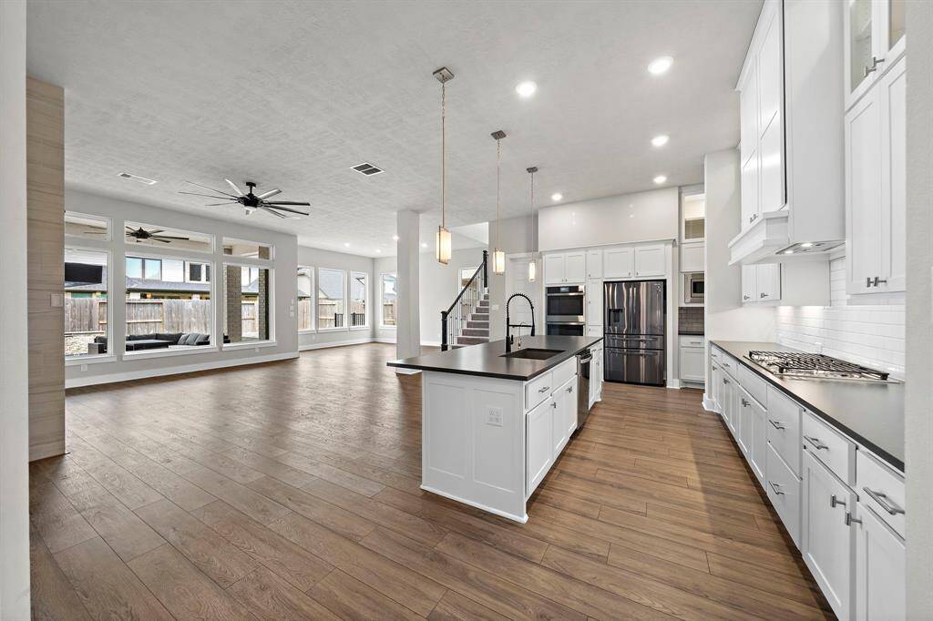 Whether you're cooking for a crowd or enjoying a quiet morning coffee, this kitchen is as practical as it is beautiful—truly the perfect blend of luxury and convenience!