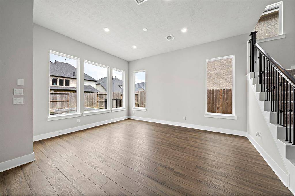 Spacious breakfast area that provides space large enough for a formal table.