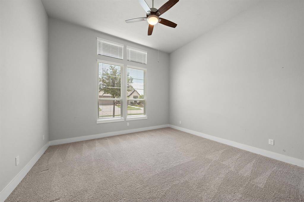 This home offers the convenience of a secondary bedroom downstairs.