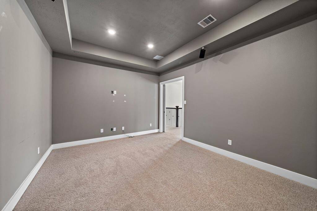 Designed for movie nights, game days, and immersive binge-watching, this space offers the perfect blend of comfort and technology.