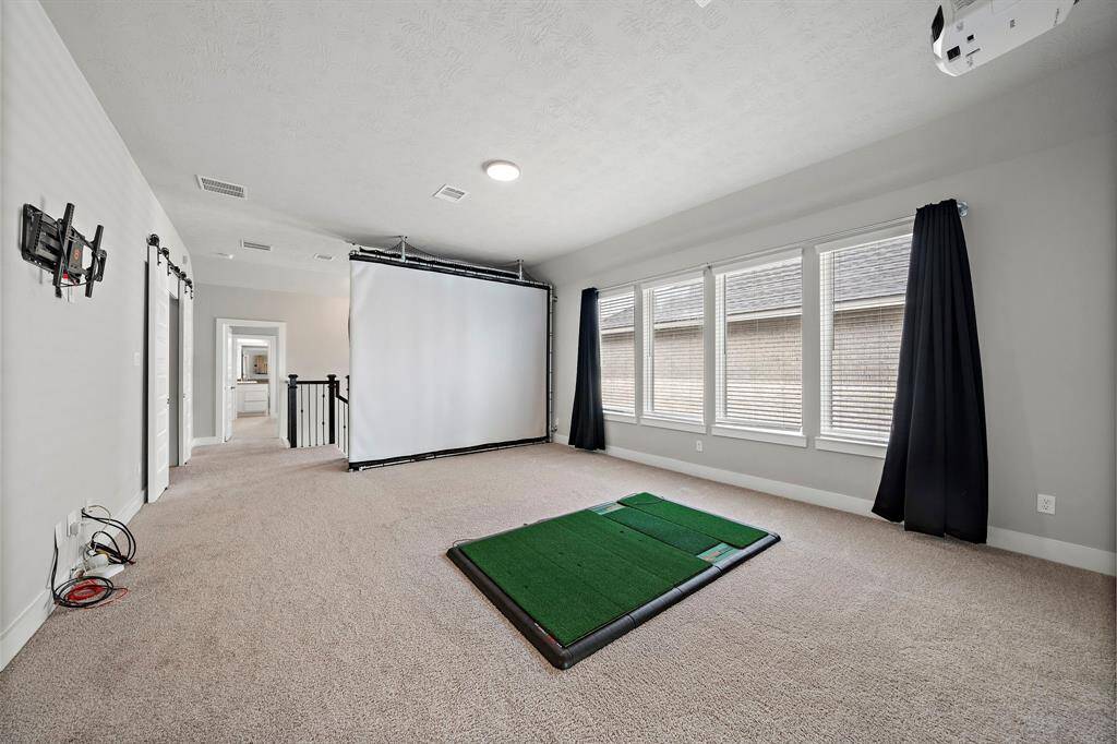 Experience the ultimate in-home entertainment in this massive game room!
