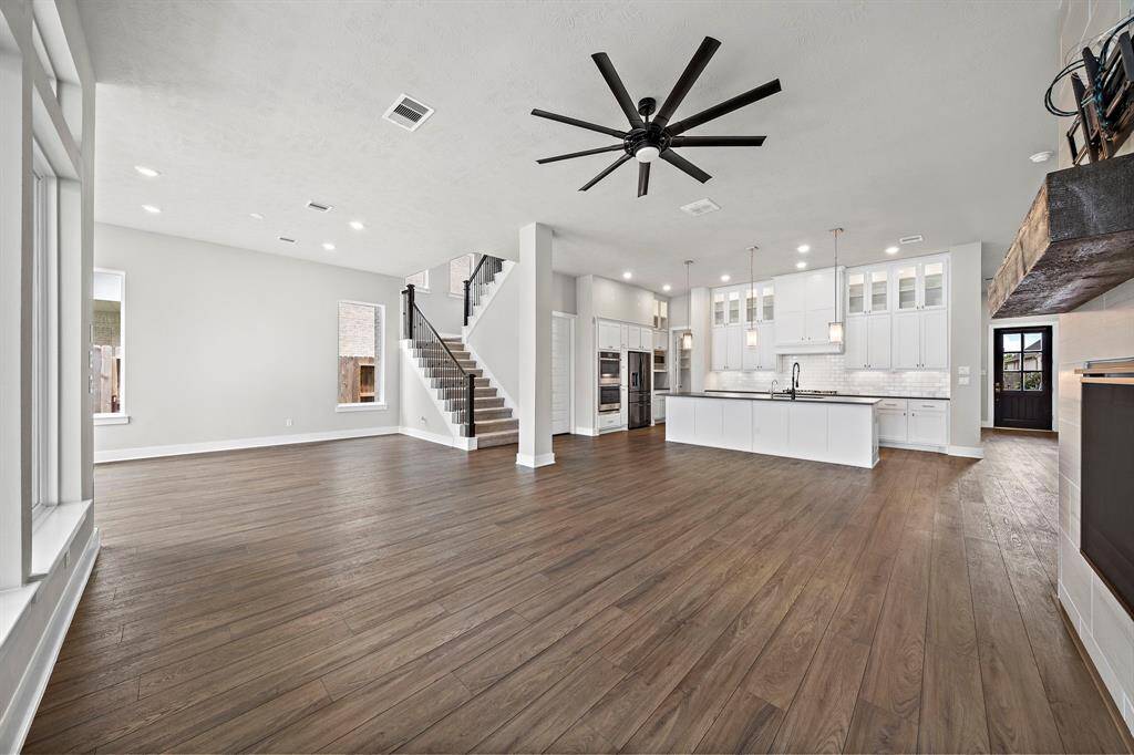 Welcome home, this stunning 2021 home boasts 5 bedrooms, 4.5 baths, and a spacious open concept design that exudes luxury and comfort.