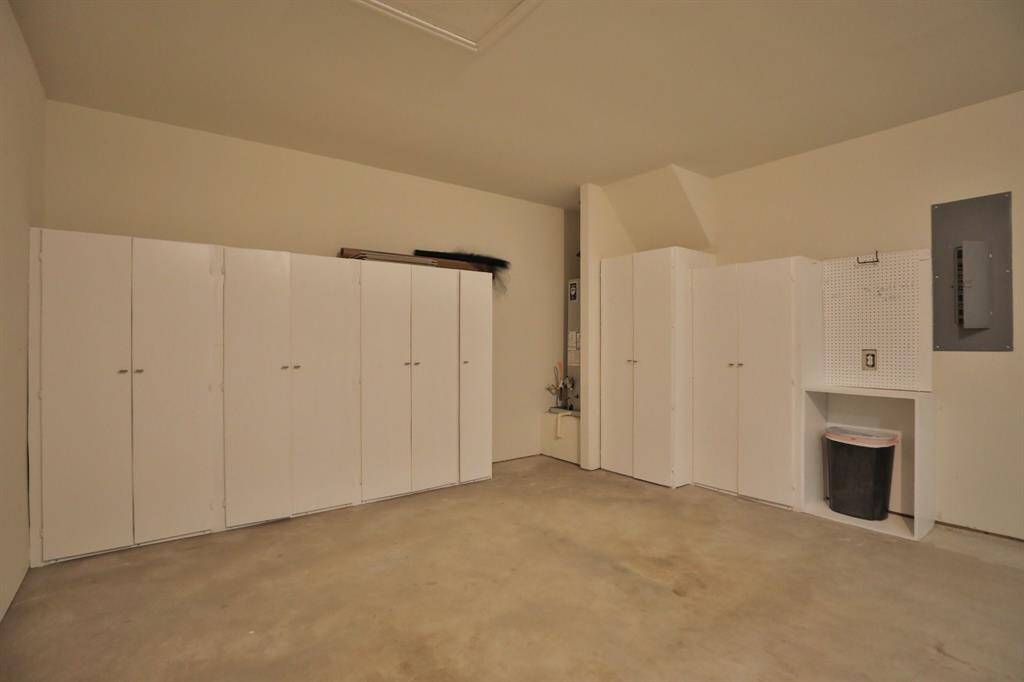 Added cabinetry to garage. Garage door opener has replaced motor and parts.
