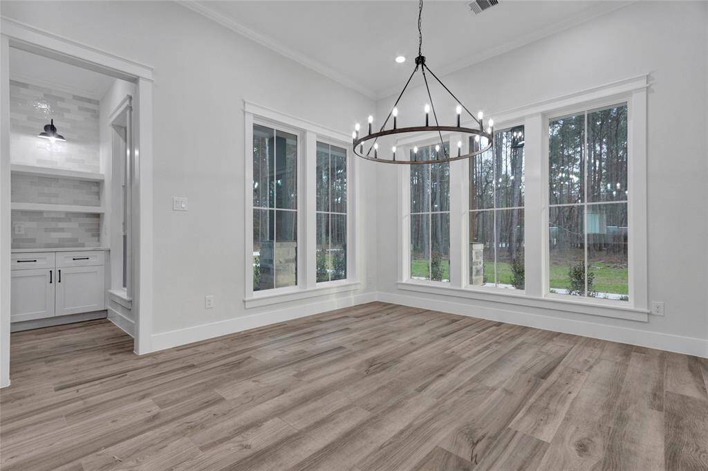Staged photo of exact floorplan from another listing