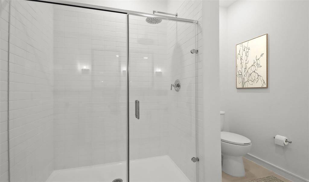 Walk-in shower in primary bath (*Photo not of actual home and used for illustration purposes only.)