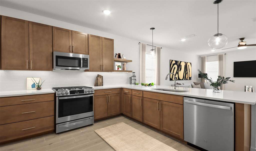 Stylish kitchen with quartz countertops